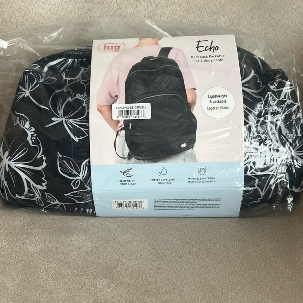 NWT Lug Echo Packable SE in Outline Floral Black